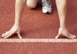 Athlete at the start line of the stadium